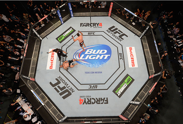MEXICO CITY, MEXICO - NOVEMBER 15: An overhead view of the Octagon as Fabricio Werdum celebrates after knocking out Mark Hunt in their interim UFC heavyweight championship bout during the UFC 180 event at Arena Ciudad de Mexico on November 15, 2014 in Me