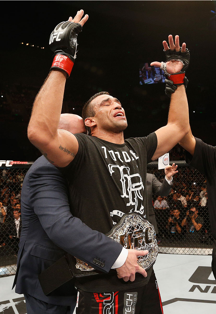MEXICO CITY, MEXICO - NOVEMBER 15: Fabricio Werdum of Brazil celebrates after knocking out Mark Hunt in their interim UFC heavyweight championship bout during the UFC 180 event at Arena Ciudad de Mexico on November 15, 2014 in Mexico City, Mexico. (Phot