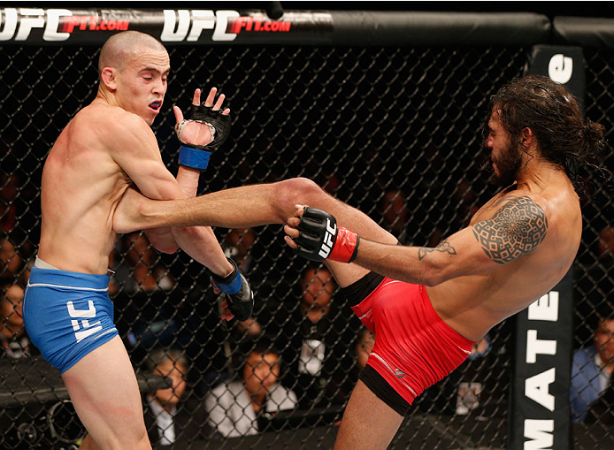 MEXICO CITY, MEXICO - NOVEMBER 15: (R-L) Marco Beltra kicks Marlon Vera in their bantamweight bout during the UFC 180 event at Arena Ciudad de Mexico on November 15, 2014 in Mexico City, Mexico. (Photo by Josh Hedges/Zuffa LLC/Zuffa LLC via Getty Images