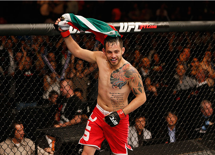 MEXICO CITY, MEXICO - NOVEMBER 15: Henry Briones celebrates after submitting Guido Cannetti in their bantamweight bout during the UFC 180 event at Arena Ciudad de Mexico on November 15, 2014 in Mexico City, Mexico. (Photo by Josh Hedges/Zuffa LLC/Zuffa
