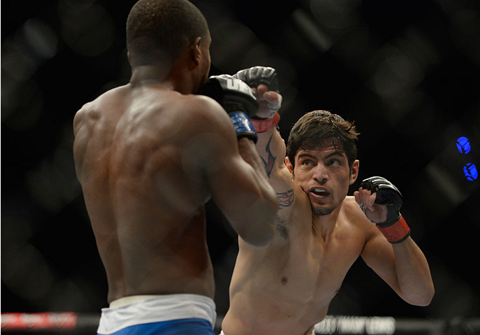 MEXICO CITY, MEXICO - NOVEMBER 15: (L-R) Gabriel Benitez punches Humberto Brown in their featherweight bout during the UFC 180 event at Arena Ciudad de Mexico on November 15, 2014 in Mexico City, Mexico. (Photo by Jeff Bottari/Zuffa LLC/Zuffa LLC via Ge