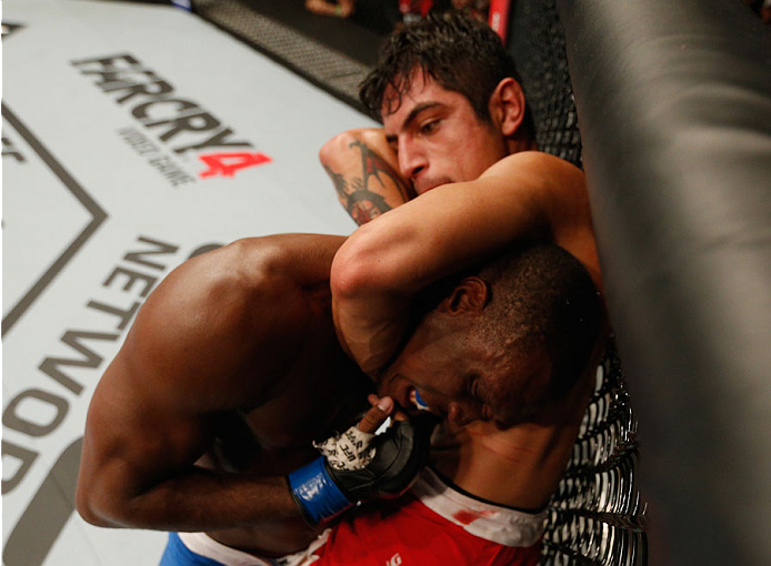 MEXICO CITY, MEXICO - NOVEMBER 15: (R-L) Gabriel Benitez attempts to submit Humberto Brown in their featherweight bout during the UFC 180 event at Arena Ciudad de Mexico on November 15, 2014 in Mexico City, Mexico. (Photo by Josh Hedges/Zuffa LLC/Zuffa