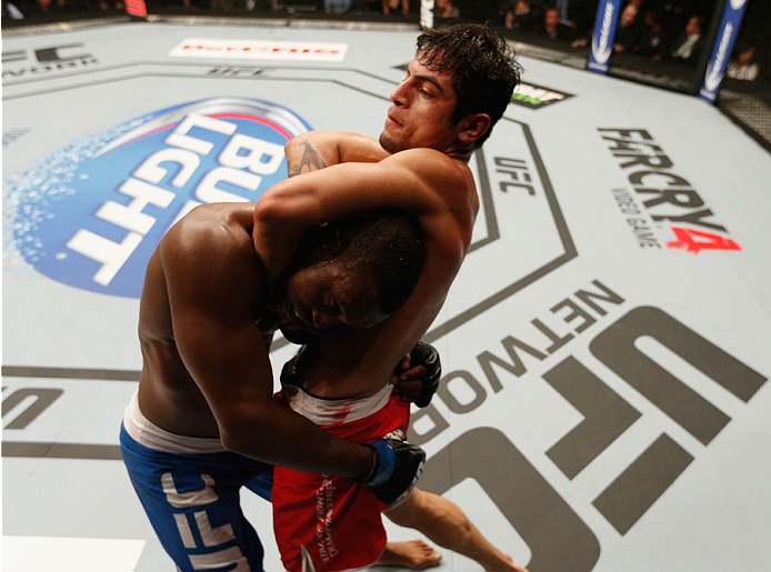 MEXICO CITY, MEXICO - NOVEMBER 15: (R-L) Gabriel Benitez attempts to submit Humberto Brown in their featherweight bout during the UFC 180 event at Arena Ciudad de Mexico on November 15, 2014 in Mexico City, Mexico. (Photo by Josh Hedges/Zuffa LLC/Zuffa