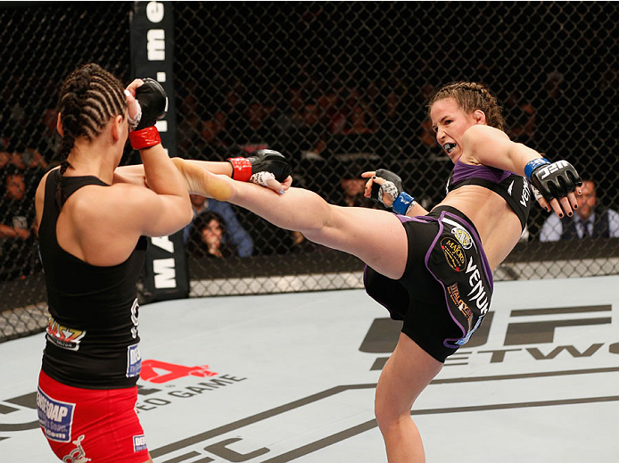 MEXICO CITY, MEXICO - NOVEMBER 15: (R-L) Leslie Smith kicks Jessica Eye in their women's bantamweight bout during the UFC 180 event at Arena Ciudad de Mexico on November 15, 2014 in Mexico City, Mexico. (Photo by Josh Hedges/Zuffa LLC/Zuffa LLC via Gett