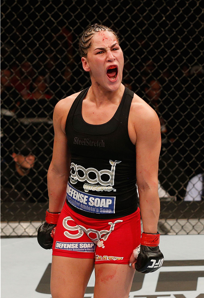 MEXICO CITY, MEXICO - NOVEMBER 15: Jessica Eye celebrates her victory over Leslie Smith in their women's bantamweight bout during the UFC 180 event at Arena Ciudad de Mexico on November 15, 2014 in Mexico City, Mexico. (Photo by Josh Hedges/Zuffa LLC/Zu