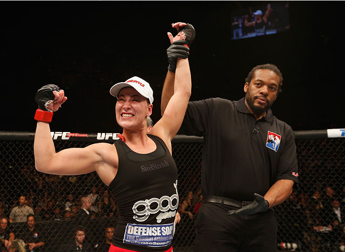 MEXICO CITY, MEXICO - NOVEMBER 15: Jessica Eye celebrates her victory over Leslie Smith in their women's bantamweight bout during the UFC 180 event at Arena Ciudad de Mexico on November 15, 2014 in Mexico City, Mexico. (Photo by Josh Hedges/Zuffa LLC/Zu