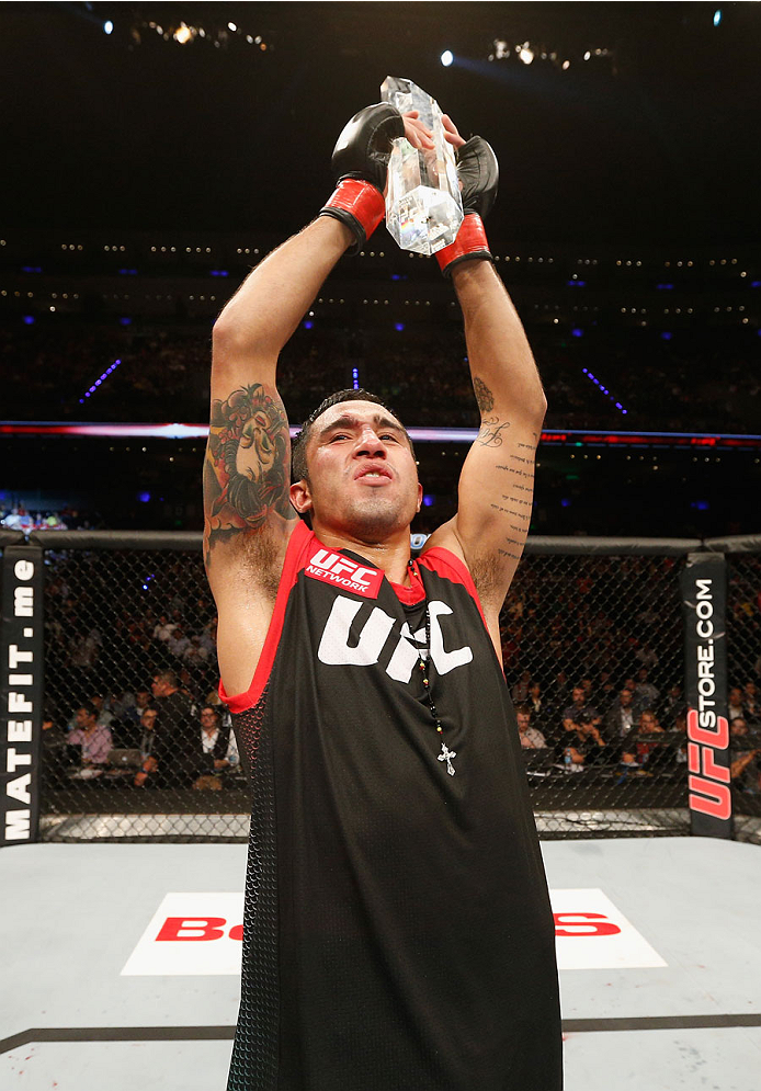 MEXICO CITY, MEXICO - NOVEMBER 15: Alejandro Perez celebrates his victory over Jose Quinonez in their bantamweight bout and becomes the winner of the Ultimate Fighter Latin Americaduring the UFC 180 event at Arena Ciudad de Mexico on November 15, 2014 in