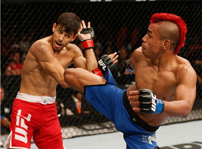 MEXICO CITY, MEXICO - NOVEMBER 15: (R-L) Leonardo Morales kicks Yair Rodriguez in their featherweight bout during the UFC 180 event at Arena Ciudad de Mexico on November 15, 2014 in Mexico City, Mexico. (Photo by Josh Hedges/Zuffa LLC/Zuffa LLC via Gett