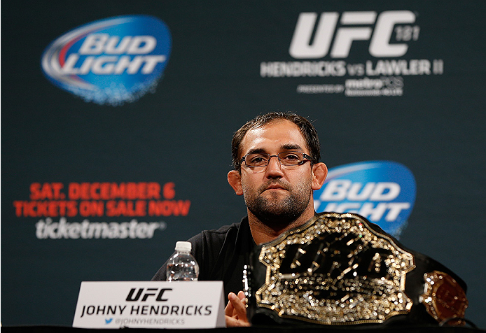 LAS VEGAS, NV - SEPTEMBER 26: UFC welterweight champion Johny Hendricks interacts with media and fans during the UFC 181 press conference at the MGM Grand Conference Center on September 26, 2014 in Las Vegas, Nevada. (Photo by Josh Hedges/Zuffa LLC/Zuffa