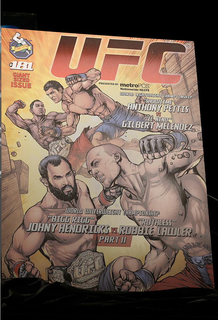 LAS VEGAS, NV - SEPTEMBER 26: The event poster featuring artwork by DC Comics is unveiled during the UFC 181 press conference at the MGM Grand Conference Center on September 26, 2014 in Las Vegas, Nevada. (Photo by Josh Hedges/Zuffa LLC/Zuffa LLC via Gett
