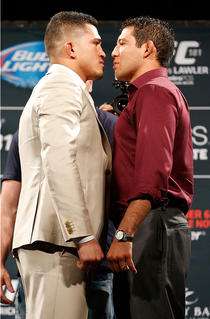 LAS VEGAS, NV - SEPTEMBER 26: (L-R) Opponents Anthony Pettis and Gilbert Melendez face off during the UFC 181 press conference at the MGM Grand Conference Center on September 26, 2014 in Las Vegas, Nevada. (Photo by Josh Hedges/Zuffa LLC/Zuffa LLC via Get
