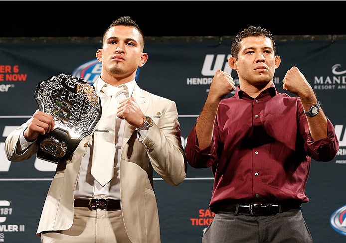 LAS VEGAS, NV - SEPTEMBER 26: (L-R) Opponents Anthony Pettis and Gilbert Melendez pose for photos during the UFC 181 press conference at the MGM Grand Conference Center on September 26, 2014 in Las Vegas, Nevada. (Photo by Josh Hedges/Zuffa LLC/Zuffa LLC