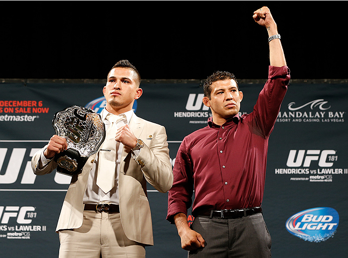 LAS VEGAS, NV - SEPTEMBER 26: (L-R) Opponents Anthony Pettis and Gilbert Melendez pose for photos during the UFC 181 press conference at the MGM Grand Conference Center on September 26, 2014 in Las Vegas, Nevada. (Photo by Josh Hedges/Zuffa LLC/Zuffa LLC