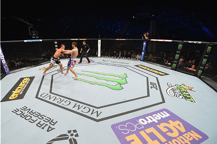 LAS VEGAS, NV - MAY 23: (L-R) Leo Kuntz punches Islam Makhachev of Russia in their lightweight bout during the UFC 187 event at the MGM Grand Garden Arena on May 23, 2015 in Las Vegas, Nevada. (Photo by Josh Hedges/Zuffa LLC/Zuffa LLC via Getty Images)