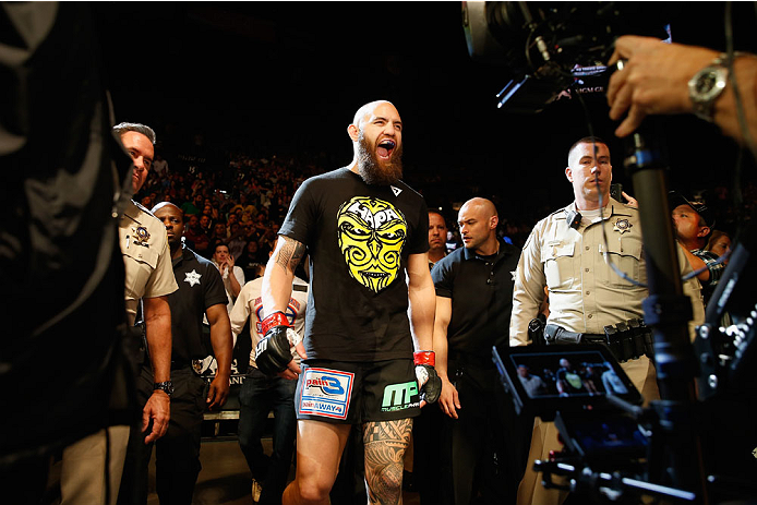 LAS VEGAS, NV - MAY 23: Travis Browne walks to the Octagon to face Andrei Arlovski in their heavyweight bout during the UFC 187 event at the MGM Grand Garden Arena on May 23, 2015 in Las Vegas, Nevada. (Photo by Christian Petersen/Zuffa LLC/Zuffa LLC vi