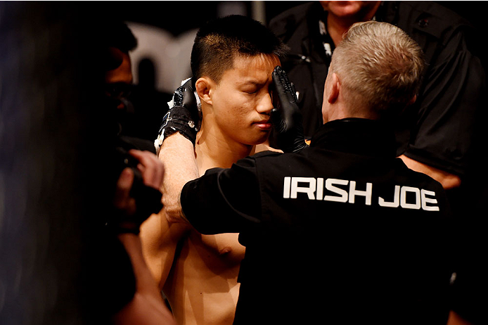 MELBOURNE, AUSTRALIA - NOVEMBER 15: Ben Nguyen prepares for his fight against Ryan Benoit (not pictured) with cut man Irish Joe before his flyweight bout during the UFC 193 event at Etihad Stadium on November 15, 2015 in Melbourne, Australia. (Photo by