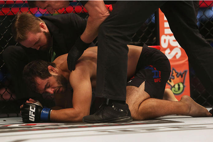 MELBOURNE, AUSTRALIA - NOVEMBER 15: Anton Zafir of Australia goes to ground after defeat to James Moontasri of the United States in their welterweight bout during the UFC 193 event at Etihad Stadium on November 15, 2015 in Melbourne, Australia. (Photo b