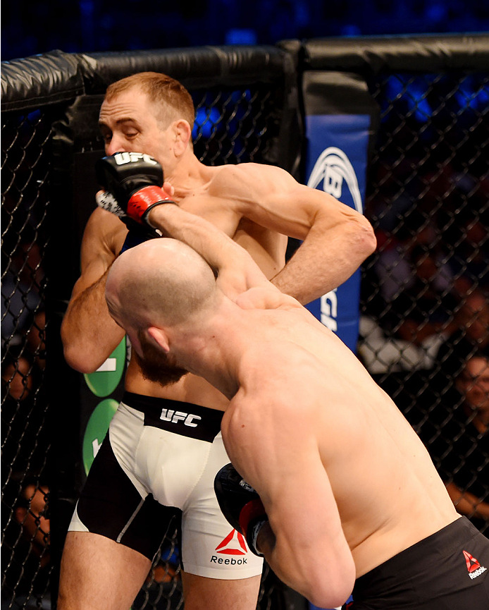 MELBOURNE, AUSTRALIA - NOVEMBER 15: Richard Walsh (R) throws a punch against Steven Kennedy (L) in round one of their welterweight bout during the UFC 193 event at Etihad Stadium on November 15, 2015 in Melbourne, Australia. (Photo by Josh Hedges/Zuffa