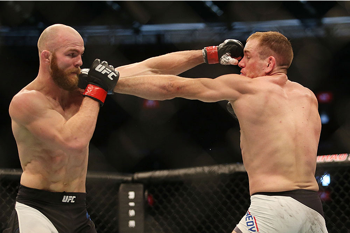 MELBOURNE, AUSTRALIA - NOVEMBER 15: Richard Walsh of Australia (L) and Steven Kennedy of England compete in their welterweight bout during the UFC 193 event at Etihad Stadium on November 15, 2015 in Melbourne, Australia. (Photo by Pat Scala /Zuffa LLC/Z