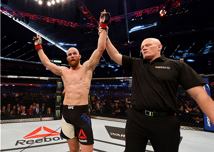 MELBOURNE, AUSTRALIA - NOVEMBER 15: Richard Walsh is announced winner by unanimous decision after his fight against Steven Kennedy in their welterweight bout during the UFC 193 event at Etihad Stadium on November 15, 2015 in Melbourne, Australia. (Photo