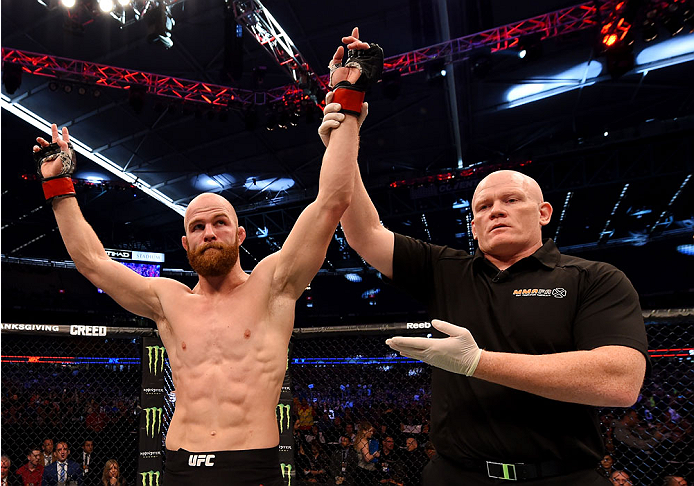 MELBOURNE, AUSTRALIA - NOVEMBER 15: Richard Walsh is announced winner by unanimous decision after his fight against Steven Kennedy in their welterweight bout during the UFC 193 event at Etihad Stadium on November 15, 2015 in Melbourne, Australia. (Photo