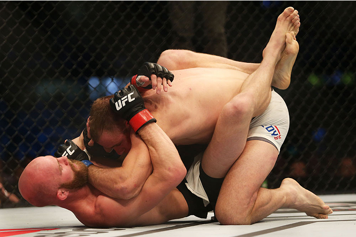 MELBOURNE, AUSTRALIA - NOVEMBER 15: Richard Walsh of Australia (L) and Steven Kennedy of England compete in their welterweight bout during the UFC 193 event at Etihad Stadium on November 15, 2015 in Melbourne, Australia. (Photo by Pat Scala /Zuffa LLC/Z