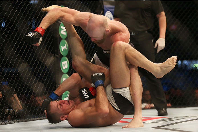MELBOURNE, AUSTRALIA - NOVEMBER 15: Richard Walsh of Australia pins down Steven Kennedy of England in their welterweight bout during the UFC 193 event at Etihad Stadium on November 15, 2015 in Melbourne, Australia. (Photo by Pat Scala /Zuffa LLC/Zuffa L