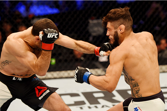 MELBOURNE, AUSTRALIA - NOVEMBER 15: (L-R) Richie Vaculik throws a left-handed punch against Danny Martinez in their flyweight bout during the UFC 193 event at Etihad Stadium on November 15, 2015 in Melbourne, Australia. (Photo by Josh Hedges/Zuffa LLC/Z