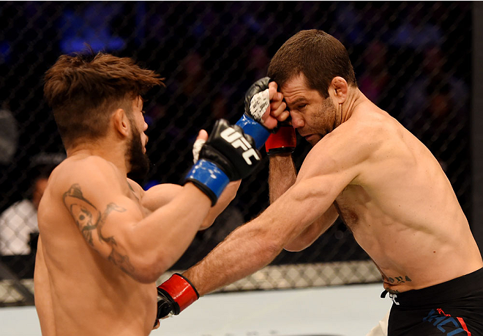 MELBOURNE, AUSTRALIA - NOVEMBER 15: (L-R) Danny Martinez and Richie Vaculik exchange punches in their flyweight bout during the UFC 193 event at Etihad Stadium on November 15, 2015 in Melbourne, Australia. (Photo by Josh Hedges/Zuffa LLC/Zuffa LLC via G