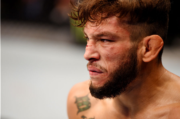 MELBOURNE, AUSTRALIA - NOVEMBER 15: Danny Martinez reacts while battling against Richie Vaculik (not pictured) in their flyweight bout during the UFC 193 event at Etihad Stadium on November 15, 2015 in Melbourne, Australia. (Photo by Josh Hedges/Zuffa L