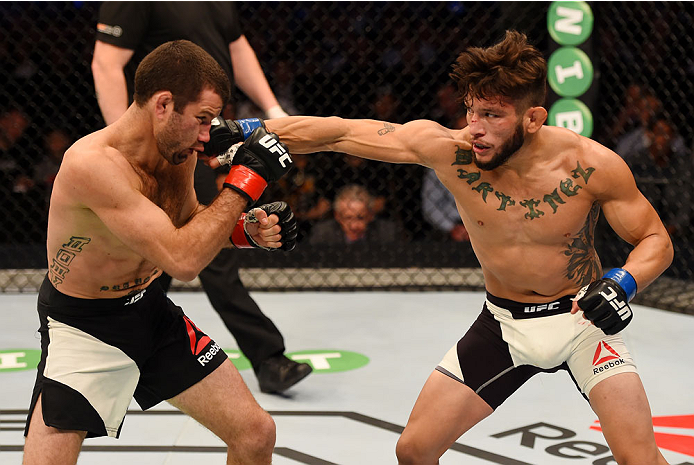 MELBOURNE, AUSTRALIA - NOVEMBER 15: Danny Martinez (R) throws a right-handed punch against Richie Vaculik (L) in their flyweight bout during the UFC 193 event at Etihad Stadium on November 15, 2015 in Melbourne, Australia. (Photo by Josh Hedges/Zuffa LL