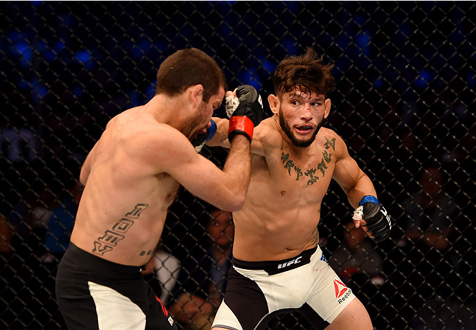 MELBOURNE, AUSTRALIA - NOVEMBER 15: Danny Martinez (R) throws a right-handed punch against Richie Vaculik (L) in their flyweight bout during the UFC 193 event at Etihad Stadium on November 15, 2015 in Melbourne, Australia. (Photo by Josh Hedges/Zuffa LL