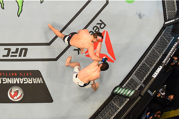 MELBOURNE, AUSTRALIA - NOVEMBER 15: (L-R) Gian Villante punches Anthony Perosh in their light heavyweight bout during the UFC 193 event at Etihad Stadium on November 15, 2015 in Melbourne, Australia. (Photo by Josh Hedges/Zuffa LLC/Zuffa LLC via Getty I