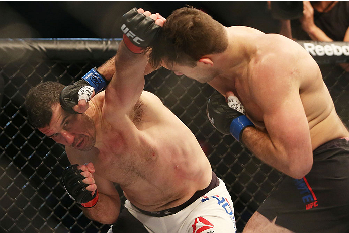 MELBOURNE, AUSTRALIA - NOVEMBER 15: Gian Villante of the United States (R) and Anthony Perosh of Australia compete in their light heavyweight bout during the UFC 193 event at Etihad Stadium on November 15, 2015 in Melbourne, Australia. (Photo by Pat Sc