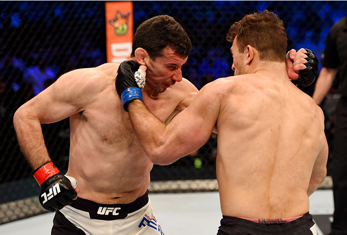 MELBOURNE, AUSTRALIA - NOVEMBER 15: Gian Villante lands a left-handed punch against Anthony Perosh in round one of their light heavyweight bout during the UFC 193 event at Etihad Stadium on November 15, 2015 in Melbourne, Australia. (Photo by Josh Hedge