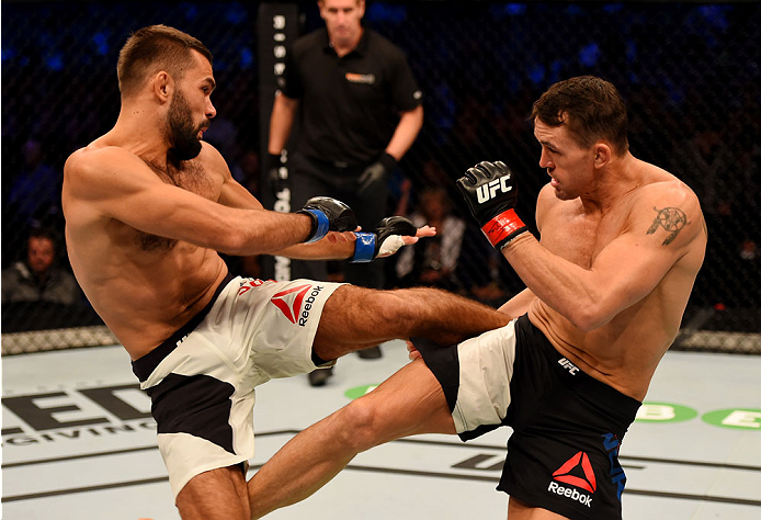 MELBOURNE, AUSTRALIA - NOVEMBER 15: Peter Sobotta and Kyle Noke exchange kicks in round one of their welterweight bout during the UFC 193 event at Etihad Stadium on November 15, 2015 in Melbourne, Australia. (Photo by Josh Hedges/Zuffa LLC/Zuffa LLC via