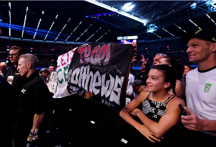 MELBOURNE, AUSTRALIA - NOVEMBER 15: Fans hold a sign that reads
'Team Matthews' as Jake Matthews takes on Akbarh Arreola in their lightweight bout during the UFC 193 event at Etihad Stadium on November 15, 2015 in Melbourne, Australia. (Photo by Josh He