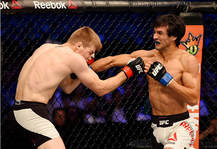 MELBOURNE, AUSTRALIA - NOVEMBER 15: Akbarh Arreola (R) throws a right-handed punch against Jake Matthews (L) in their lightweight bout during the UFC 193 event at Etihad Stadium on November 15, 2015 in Melbourne, Australia. (Photo by Josh Hedges/Zuffa L