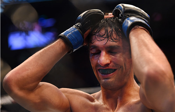 MELBOURNE, AUSTRALIA - NOVEMBER 15: Akbarh Arreola reacts after losing by TKO (doctor stoppage) in the second round against Jake Matthews (not pictured) in their lightweight bout during the UFC 193 event at Etihad Stadium on November 15, 2015 in Melbourn