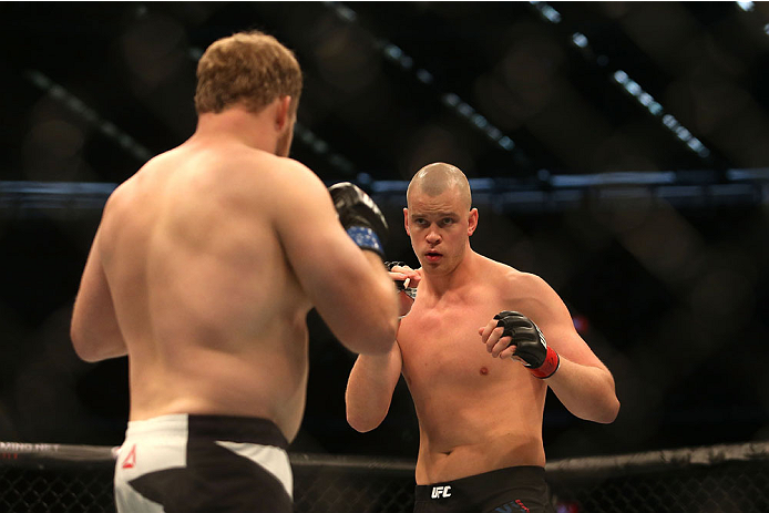 MELBOURNE, AUSTRALIA - NOVEMBER 15: Jared Rosholt of the United States (L) and Stefan Struve of the Netherlands compete in their heavyweight bout during the UFC 193 event at Etihad Stadium on November 15, 2015 in Melbourne, Australia. (Photo by Pat Scal