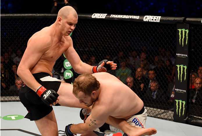 MELBOURNE, AUSTRALIA - NOVEMBER 15: (L-R) Stefan Struve kicks Jared Rosholt in round one of their heavyweight bout during the UFC 193 event at Etihad Stadium on November 15, 2015 in Melbourne, Australia. (Photo by Josh Hedges/Zuffa LLC/Zuffa LLC via Get