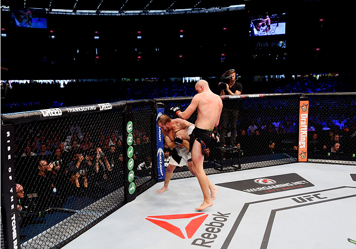MELBOURNE, AUSTRALIA - NOVEMBER 15: Stefan Struve (R) knees Jared Rosholt (L) in their heavyweight bout during the UFC 193 event at Etihad Stadium on November 15, 2015 in Melbourne, Australia. (Photo by Josh Hedges/Zuffa LLC/Zuffa LLC via Getty Images)