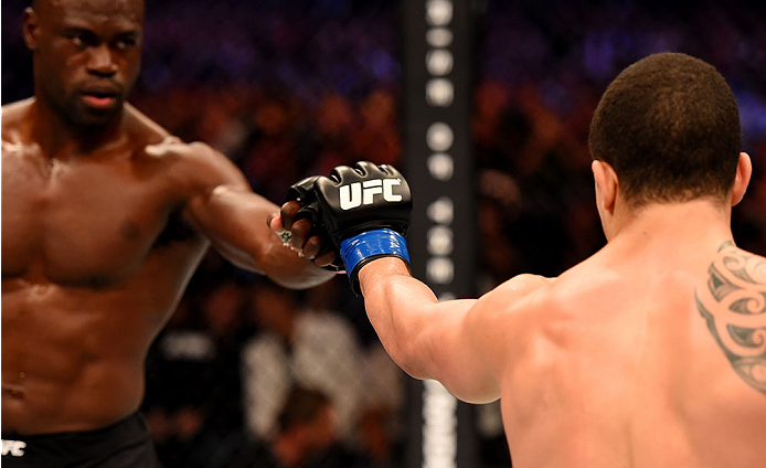 MELBOURNE, AUSTRALIA - NOVEMBER 15: (L-R) Uriah Hall and Robert Whittaker fist-bump during their middleweight bout during the UFC 193 event at Etihad Stadium on November 15, 2015 in Melbourne, Australia. (Photo by Josh Hedges/Zuffa LLC/Zuffa LLC via Get