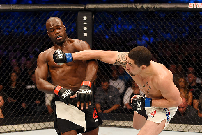 MELBOURNE, AUSTRALIA - NOVEMBER 15: Robert Whittaker (R) throws a right-handed punch against Uriah Hall (L) in their middleweight bout during the UFC 193 event at Etihad Stadium on November 15, 2015 in Melbourne, Australia. (Photo by Josh Hedges/Zuffa L