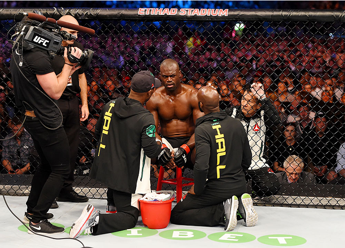 MELBOURNE, AUSTRALIA - NOVEMBER 15: Uriah Hall talks with his corner men during his fight againt Robert Whittaker (not pictured) in their middleweight bout during the UFC 193 event at Etihad Stadium on November 15, 2015 in Melbourne, Australia. (Photo b