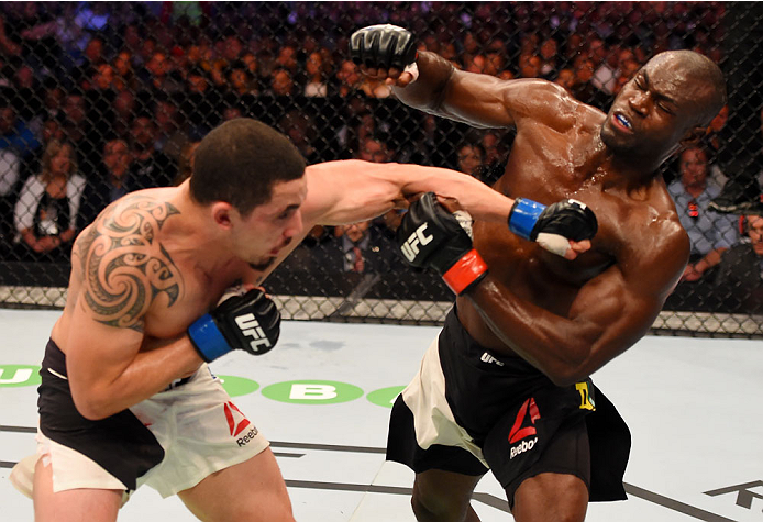 MELBOURNE, AUSTRALIA - NOVEMBER 15: (L-R) Robert Whittaker and Uriah Hall exchange punches in their middleweight bout during the UFC 193 event at Etihad Stadium on November 15, 2015 in Melbourne, Australia. (Photo by Josh Hedges/Zuffa LLC/Zuffa LLC via