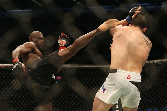 MELBOURNE, AUSTRALIA - NOVEMBER 15: Uriah Hall of Jamaica (L) kicks Robert Whittaker of New Zealand in their middleweight bout during the UFC 193 event at Etihad Stadium on November 15, 2015 in Melbourne, Australia. (Photo by Pat Scala /Zuffa LLC/Zuffa