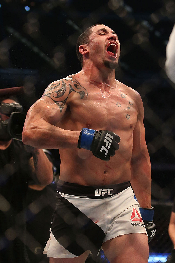 MELBOURNE, AUSTRALIA - NOVEMBER 15: Robert Whittaker of New Zealand celebrates victory over Uriah Hall of Jamaica in their middleweight bout during the UFC 193 event at Etihad Stadium on November 15, 2015 in Melbourne, Australia. (Photo by Pat Scala /Zu