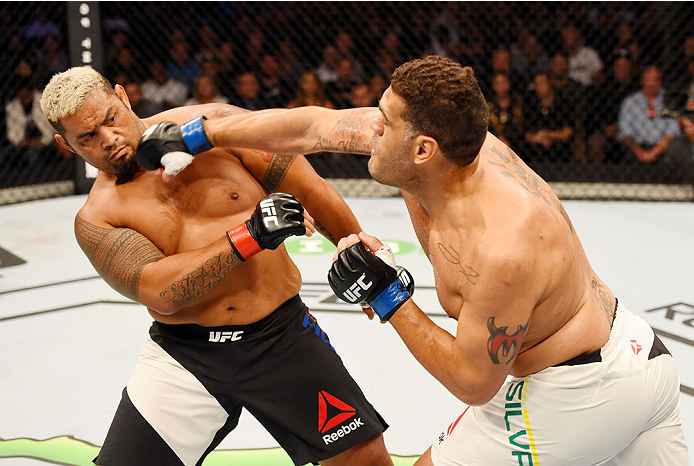 MELBOURNE, AUSTRALIA - NOVEMBER 15: Antonio Silva (R) throws a right-handed punch against Mark Hunt (L) in their heavyweight bout during the UFC 193 event at Etihad Stadium on November 15, 2015 in Melbourne, Australia. (Photo by Josh Hedges/Zuffa LLC/Zu