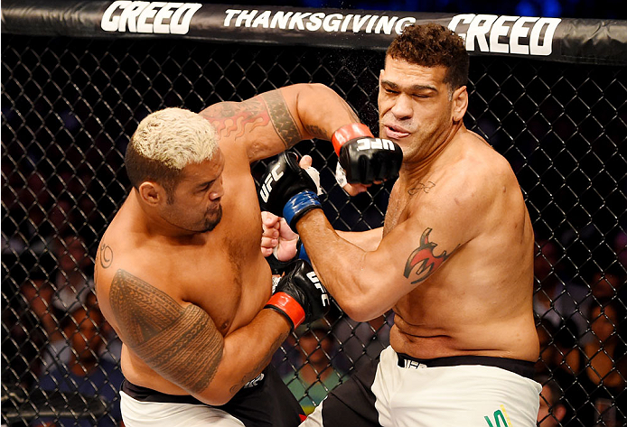 MELBOURNE, AUSTRALIA - NOVEMBER 15: (L-R) Mark Hunt lands a left-handed punch against Antonio Silva in their heavyweight bout during the UFC 193 event at Etihad Stadium on November 15, 2015 in Melbourne, Australia. (Photo by Josh Hedges/Zuffa LLC/Zuffa